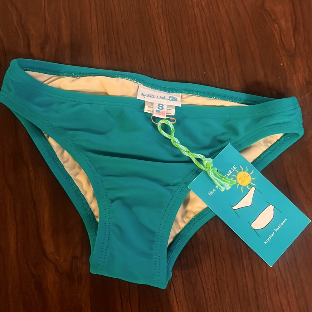 New, children’s size 8 swim bottoms